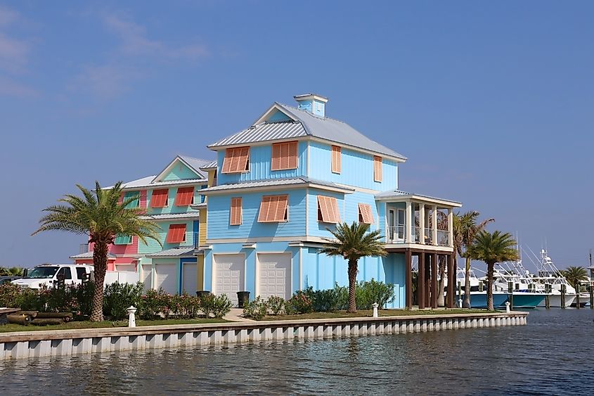 Brightly colored houses for vacation rentals near Grand Isle State Park, Louisiana, USA.Brightly colored houses for vacation rentals near Grand Isle State Park, Louisiana, USA. 