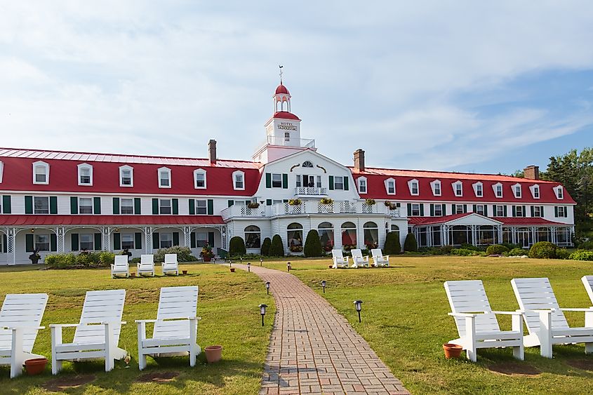 The historic red and white wooden 1864 Hotel Tadoussac. Editorial credit: Anne Richard / Shutterstock.com