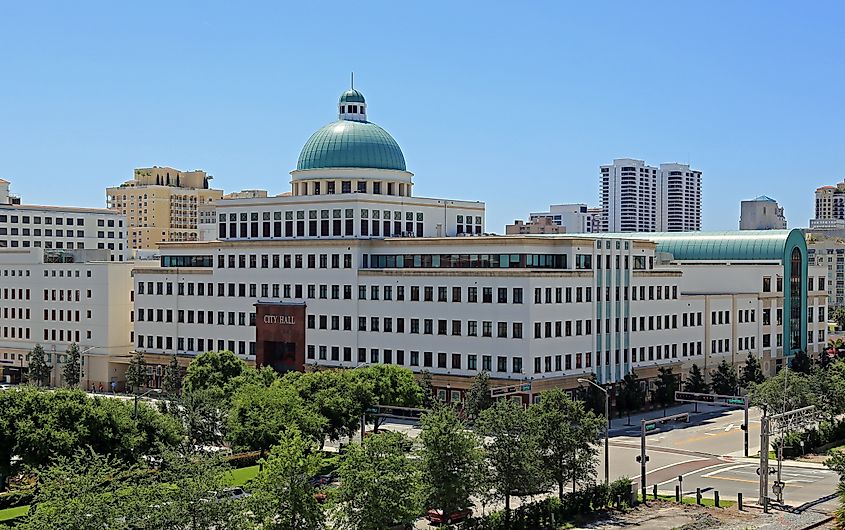 City Hall with a dome in downtown West Palm Beach, Florida, occupying an entire block. Image Credit Thomas Barrat via Shutterstock.