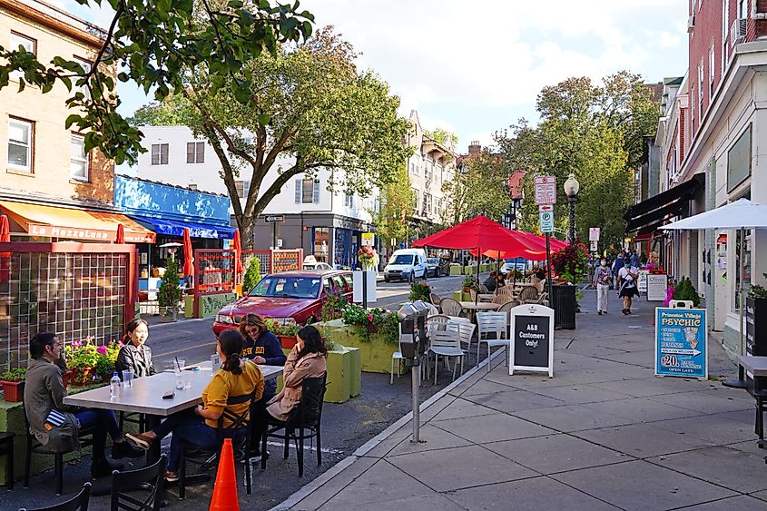 View of people dining on outdoor patios along Witherspoon Street in downtown Princeton, New Jersey, United States.
