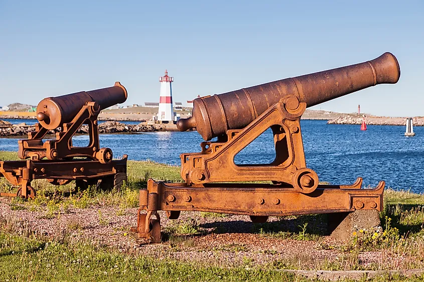 Old cannons and Saint Pierre Lighthouse.
