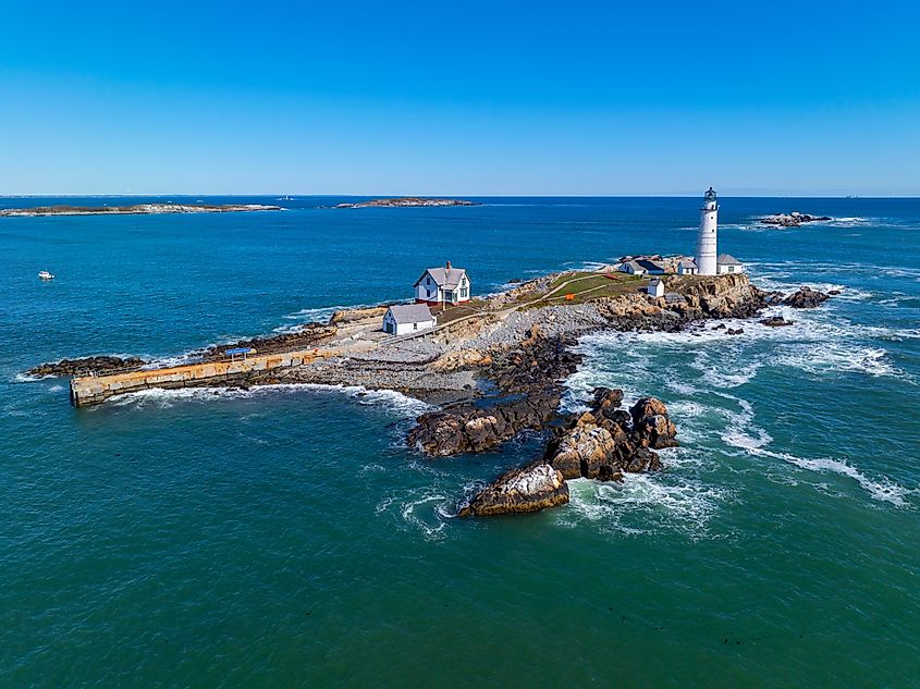 Boston Lighthouse on Little Brewster Island in Boston Harbor, Boston, Massachusetts MA, USA.