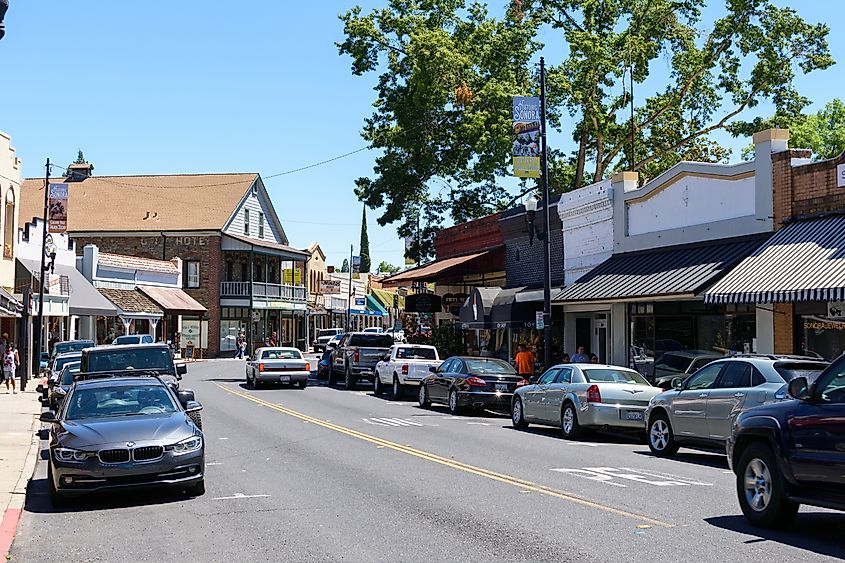 Businesses and cars lined along the busy Washington Street in downtown Sonora, California