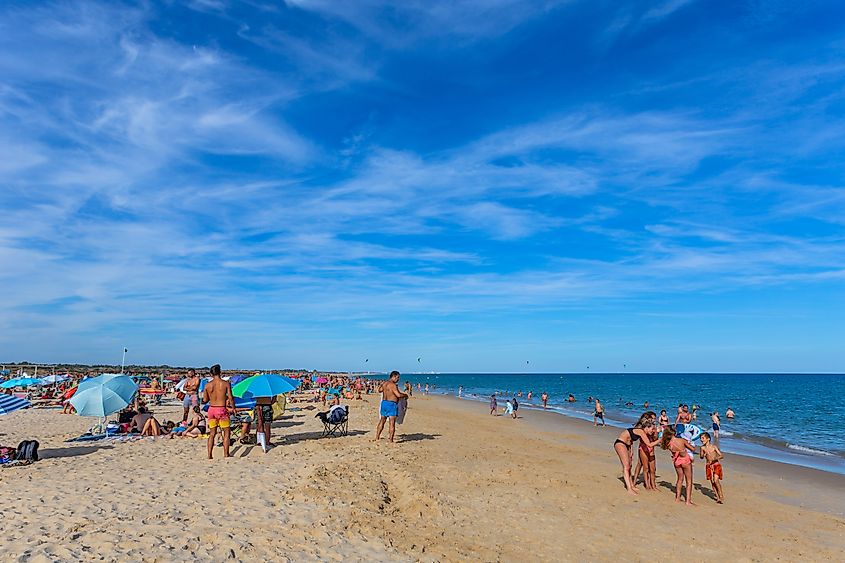 People spend the day along the famous beaches of Tavira.