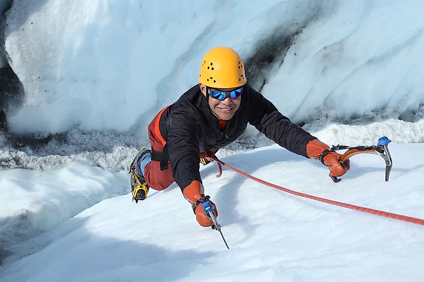 An ice climber scales a crevasse on Matanuska Glacier in Alaska.