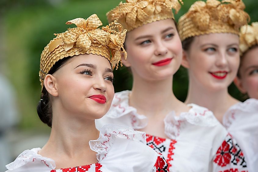 A group of Belarusian girls in national clothes during a celebration of Belarusian cultures in Gomel, Belarus. Image Credit SviatlanaLaza via Shutterstock.