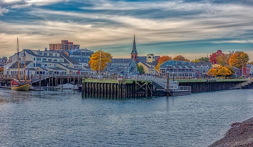 Pickering Wharf Marina in Salem with cityscape in autumn.