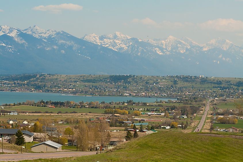 View of Polson, Montana, on a sunny day with clear skies and scenic surroundings