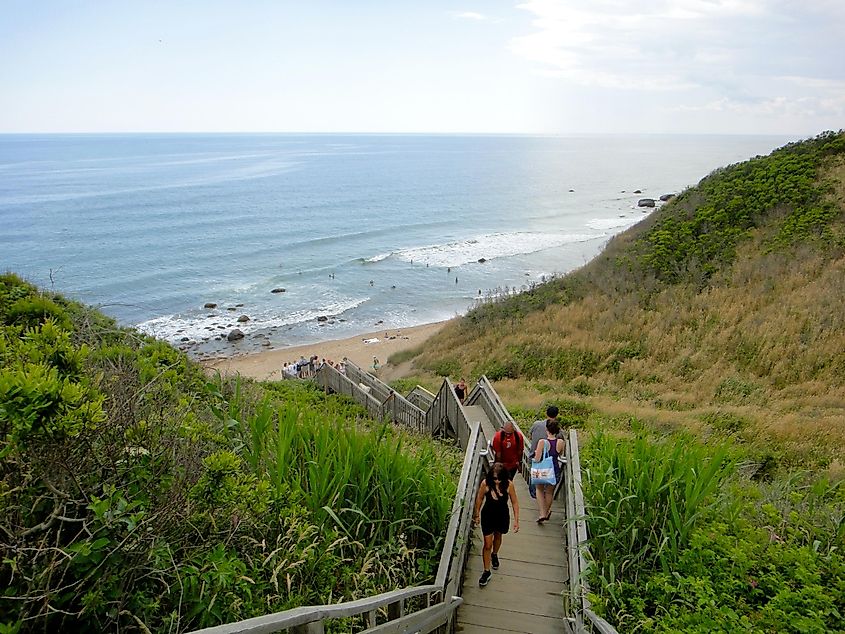 Stairs leading to the Mohegan Bluffs and beach in New Shoreham, Rhode Island. Editorial credit: quiggyt4 / Shutterstock.com