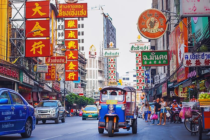 A colorful tuk-tuk in a street in Bangkok.