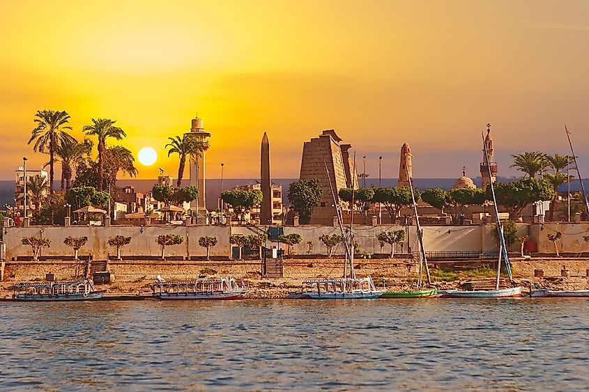 The statues of the Great Temple of Amun at sunset, with the stunning Karnak Temple in Luxor, Egypt