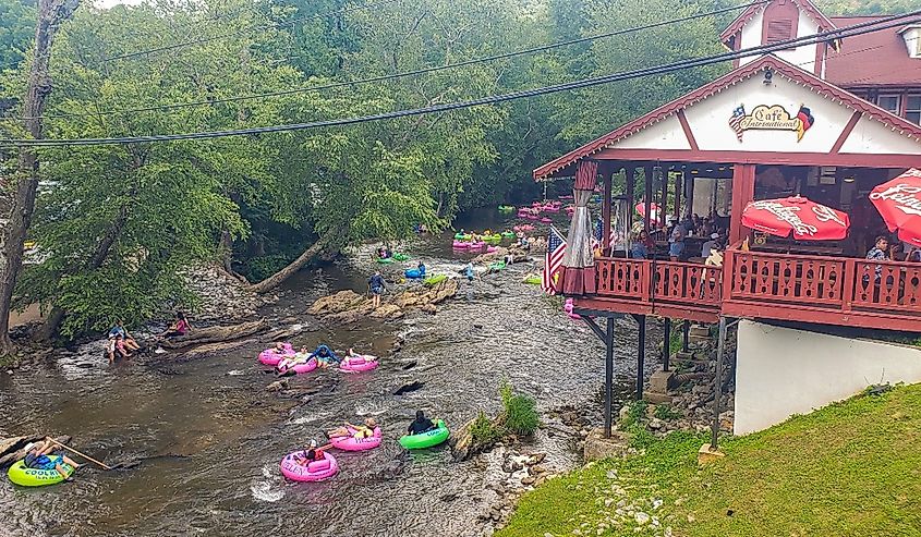 People tubing down the Chattahoochee River in downtown Helen, Georgia.