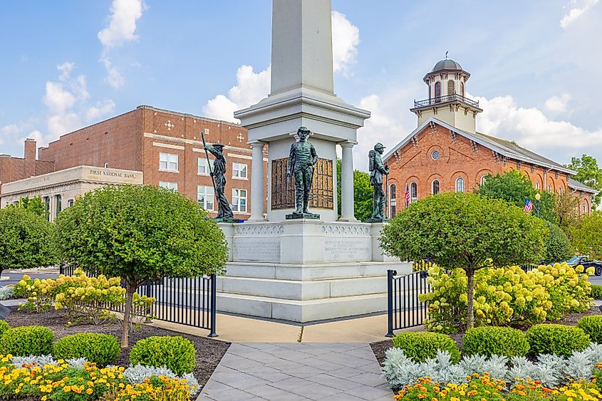 The Steuben County Soldiers Monument in downtown Angola, Indiana, with the Courthouse in the background