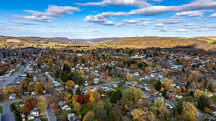 Aerial photo of fall foliage surrounding the Village of Homer, Cortland County, New York State.