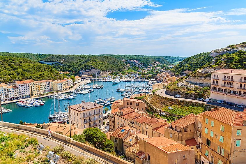 Boats and buildings along the port in Bonifacio, France.