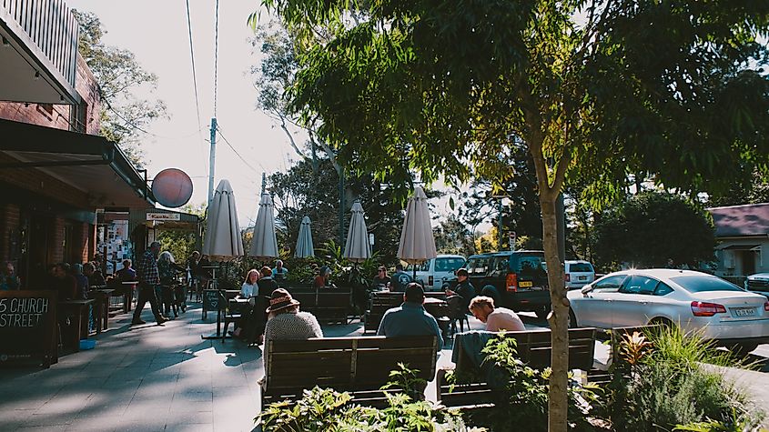 People having a relaxing time at a cafe in Bellingen, New South Wales, Australia