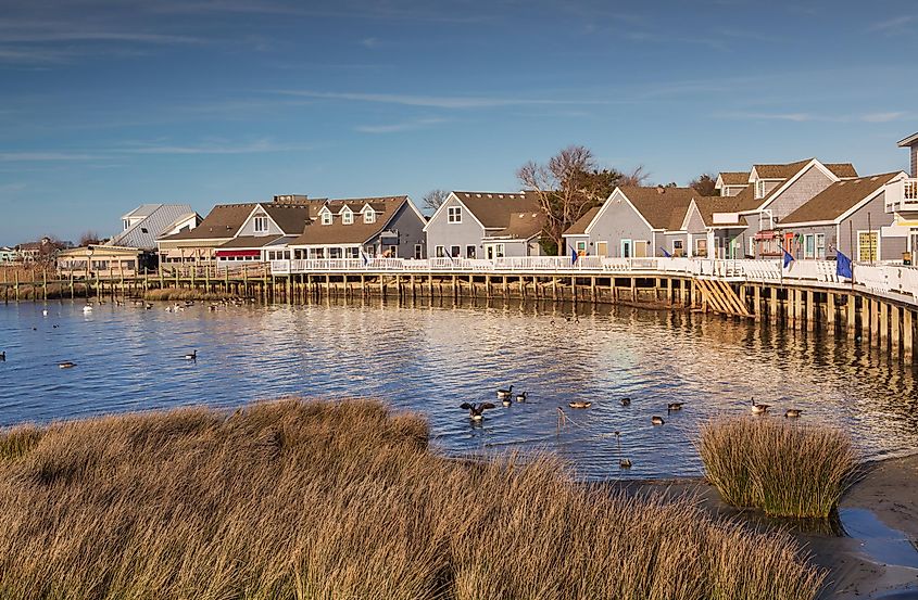 Waterfront shops and boardwalk along the Currituck Sound in Duck, North Carolina on the Outer Banks