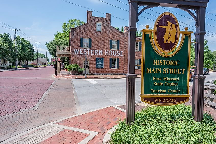 Sign and brick paved Main Street in the Historic District of St Charles, Missouri, USA. Editorial credit: Malachi Jacobs / Shutterstock.com