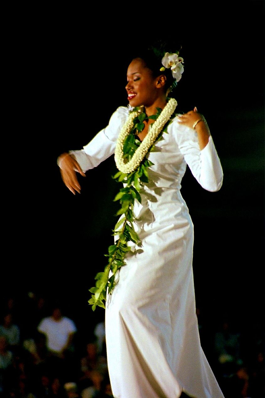Competitor in the Miss Aloha Hula competition dancing her hula 'auana segment at the 2003 Merrie Monarch festival.