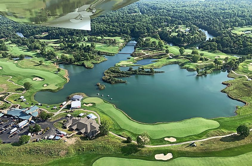 An aerial view of the Victoria National Golf Club in Newburgh, Indiana. The 18th fairway is in the foreground, with the clubhouse in center-left.