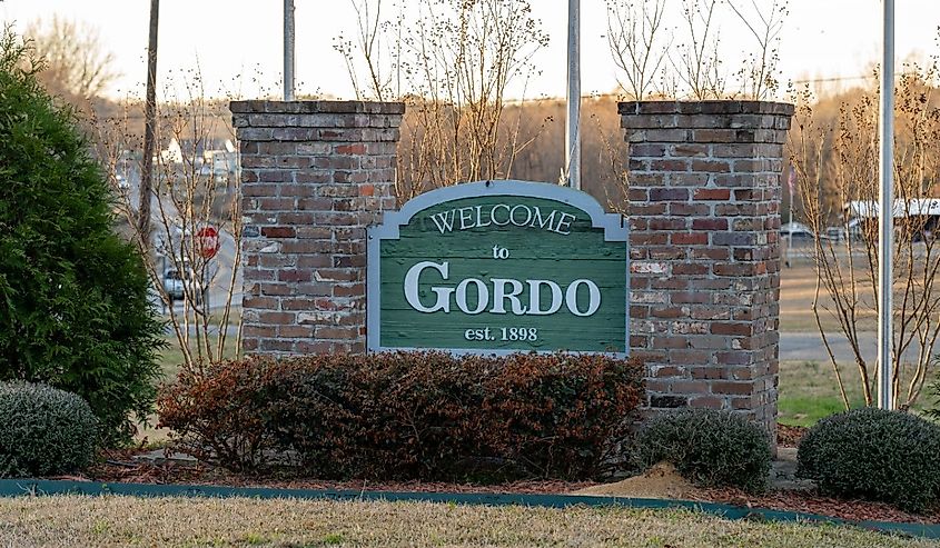 A brick sign welcomes visitors to the small town of Gordo, Alabama.