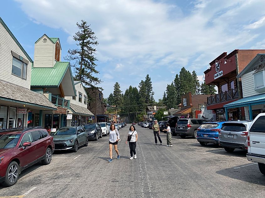 Pedestrians gather in the casual main street (Electric Ave) of Bigfork, Montana