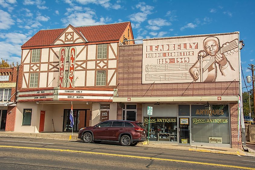  The Avon Theater and the Huddie William "Lead Belly" Ledbetter wall in downtown Huntsville, Texas. Editorial credit: Nina Alizada / Shutterstock.com