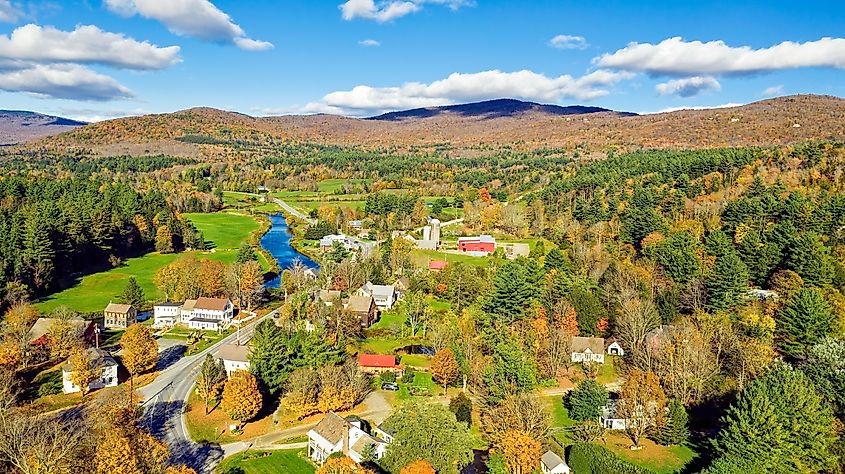 Aerial view of Weston, Vermont, showcasing the colorful fall season.