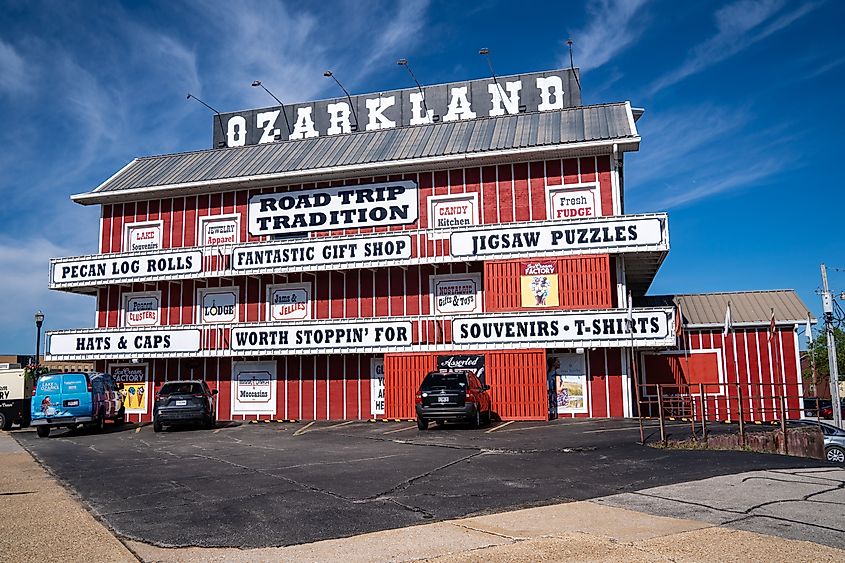 Exterior of the Ozarkland gift shop in Camdenton, Missouri, known for its Lake of the Ozarks souvenirs and candy for vacationers.