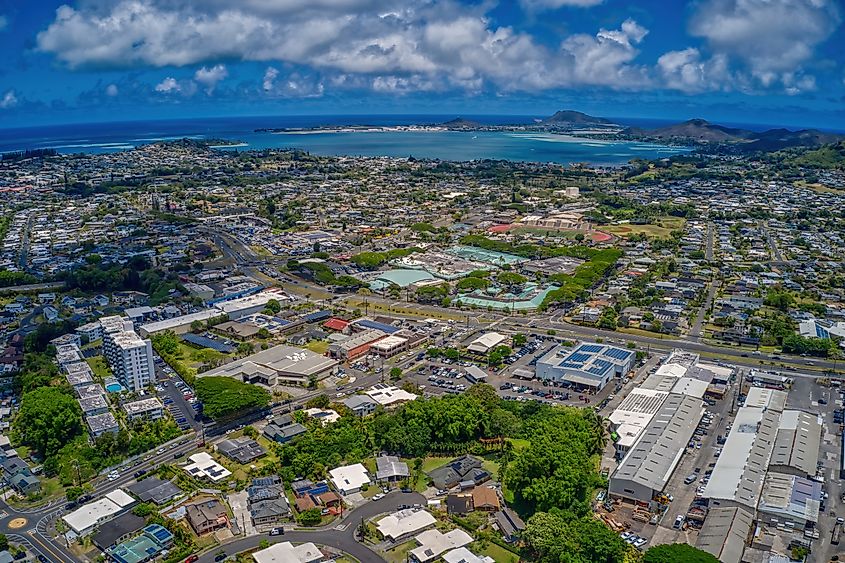 Aerial view of the Honolulu suburb of Kaneohe, Hawaii, featuring residential neighborhoods.