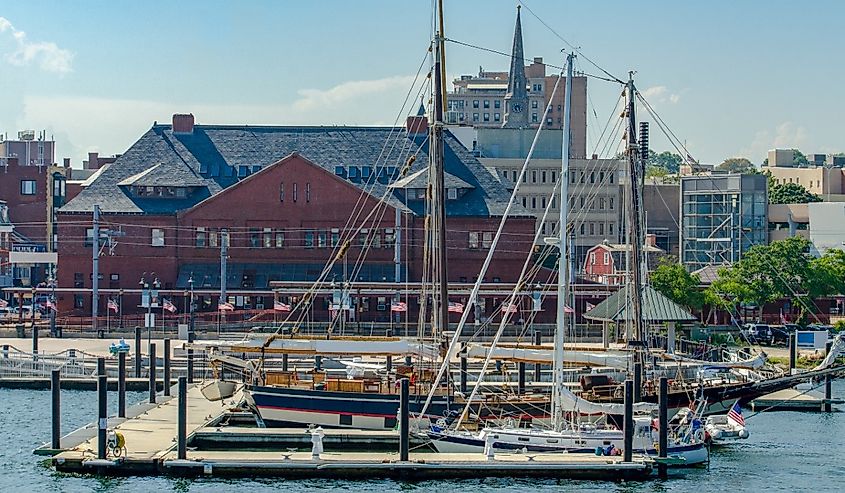 Skyline of the city of New London, Connecticut with whaling ship in the foreground.