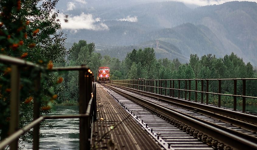 Rail road bridge running through small town of Revelstoke, British Columbia in Canadian Rockies