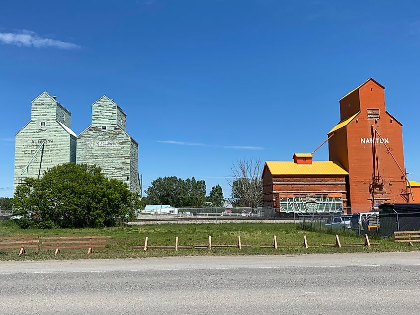 The town of Nanton's dual historic grain elevators, branded with the town name.