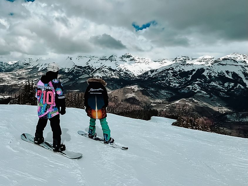 People snowboarding in Telluride, Colorado.