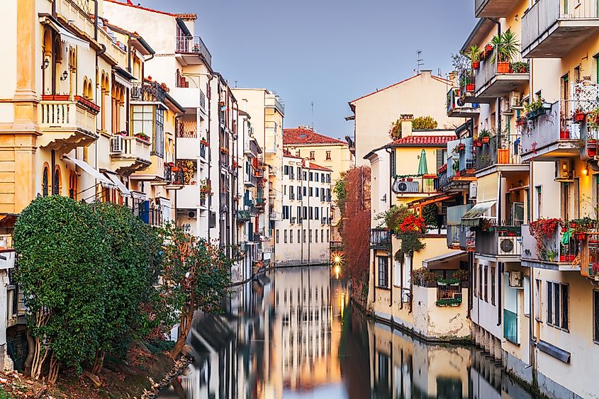 Padua, Italy canals and buildings at dusk. (Credit: Sean Pavone via Shutterstock)