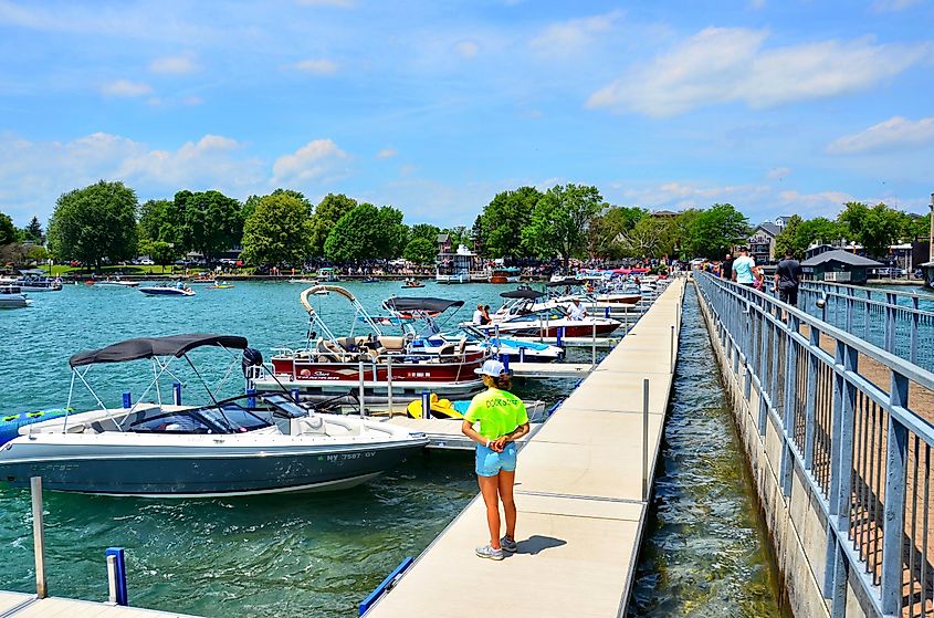 Pier and boats docked in the Skaneateles Lake, one of the Finger Lakes.