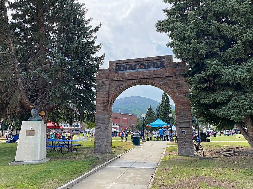 The stone arch entrance to the town square park in Anaconda, Montana, where the annual Smeltermens Day festival is in full swing. 