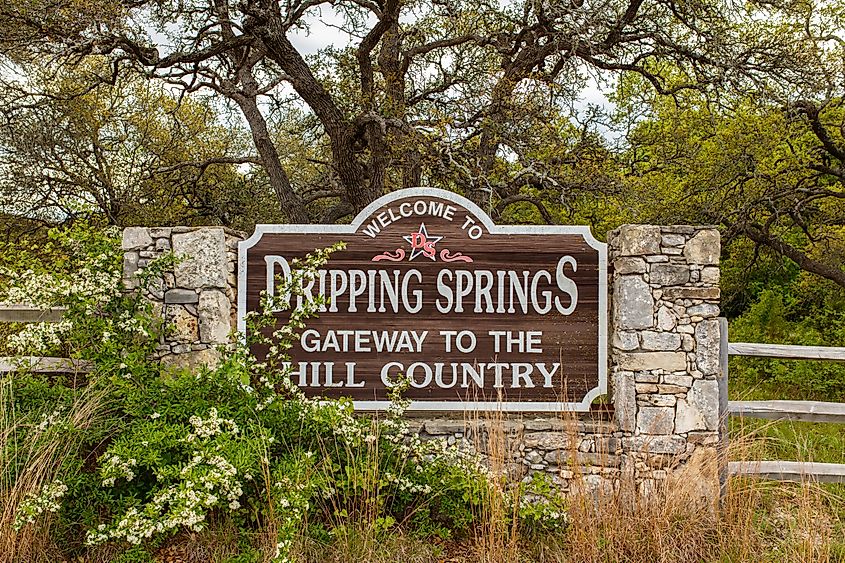 Welcome to Dripping Springs sign from this small town in the Texas Hill Country. Editorial credit: Fotoluminate LLC / Shutterstock.com