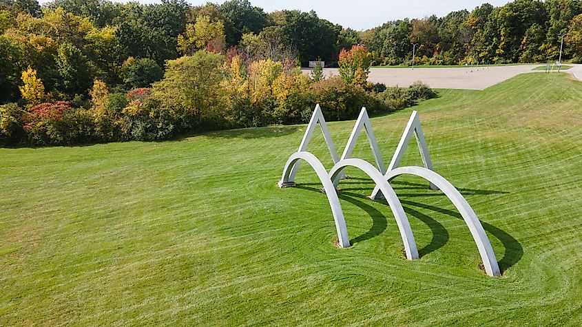 Large sculpture titled Rhythms and Vibrations by Hanna Stiebel on the Oakland University campus near Meadow Brook Amphitheater in Rochester, Michigan, USA