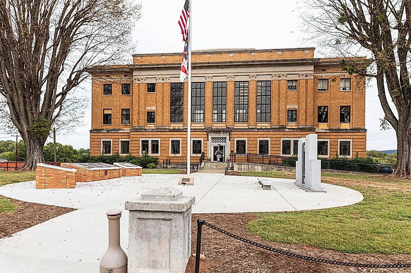 McDowell County Courthouse in Marion, North Carolina, with two probation officers exiting the front door