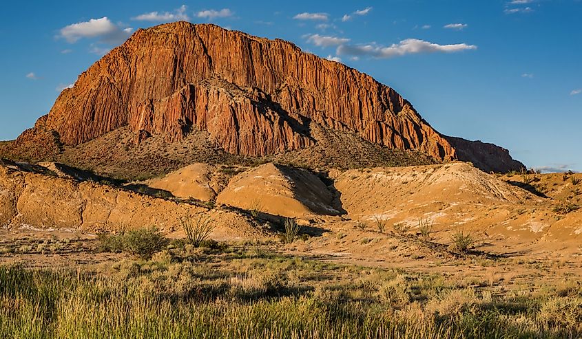 Mountain illuminated by setting sun along highway from Terlingua to Alpine, Texas