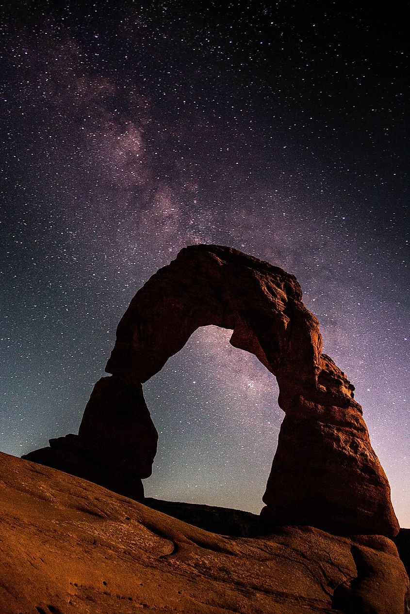 The Milky Way above Delicate Arch, Arches National Park, Utah.