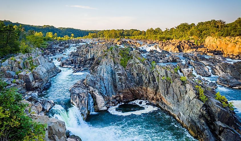 View of rapids in the Potomac River at sunset, at Great Falls Park, Virginia.
