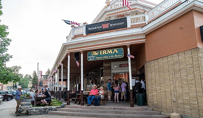 People gather outside the famous Irma Restaurant and grill in the downtown area, Cody, Wyoming