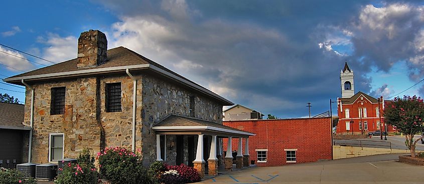 The old Union County, Georgia Jail built in 1934 with the old courthouse in the background.