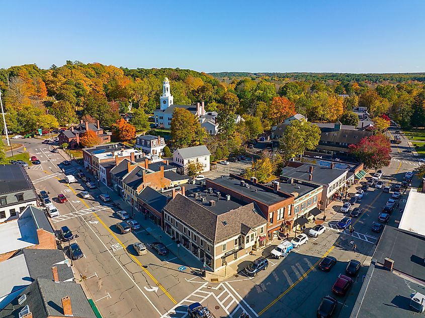 Concord historic town center aerial view in fall with fall foliage on Main Street in town of Concord, Massachusetts, USA.