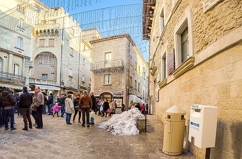 people is chatting in town square during the holidays in San Marino