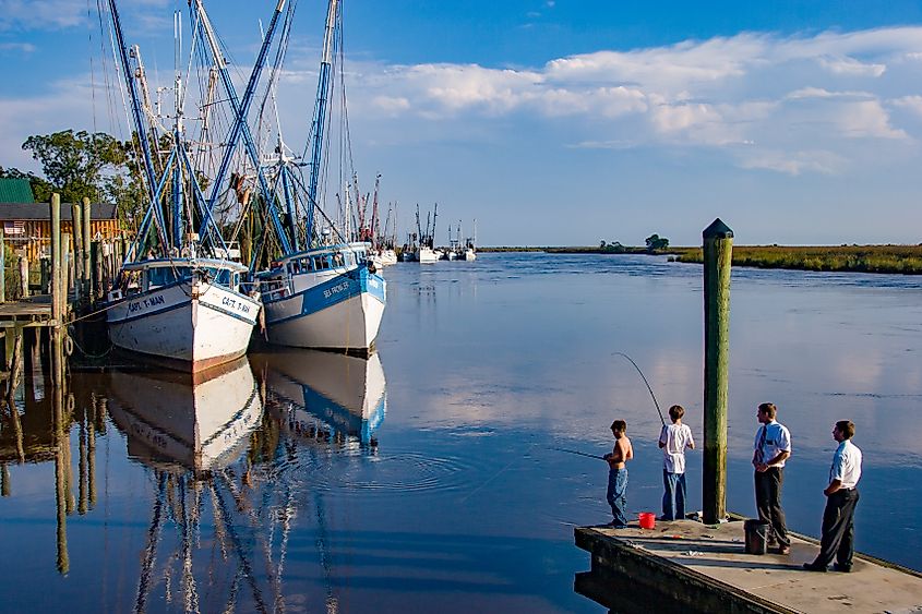 People fishing along the coast of Darien in Georgia.