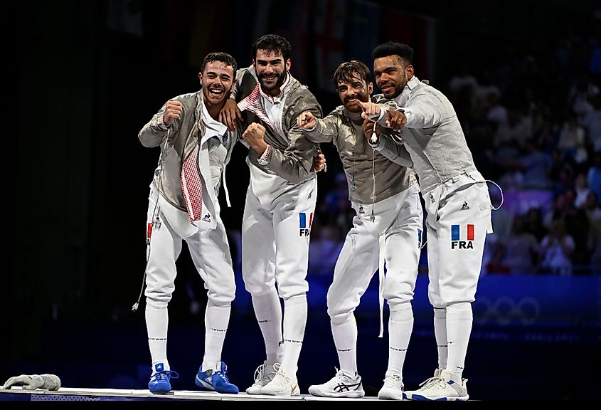 French fencing team, defeats Italian team, at the Gran Palais. Editorial credit: A.RICARDO / Shutterstock.com