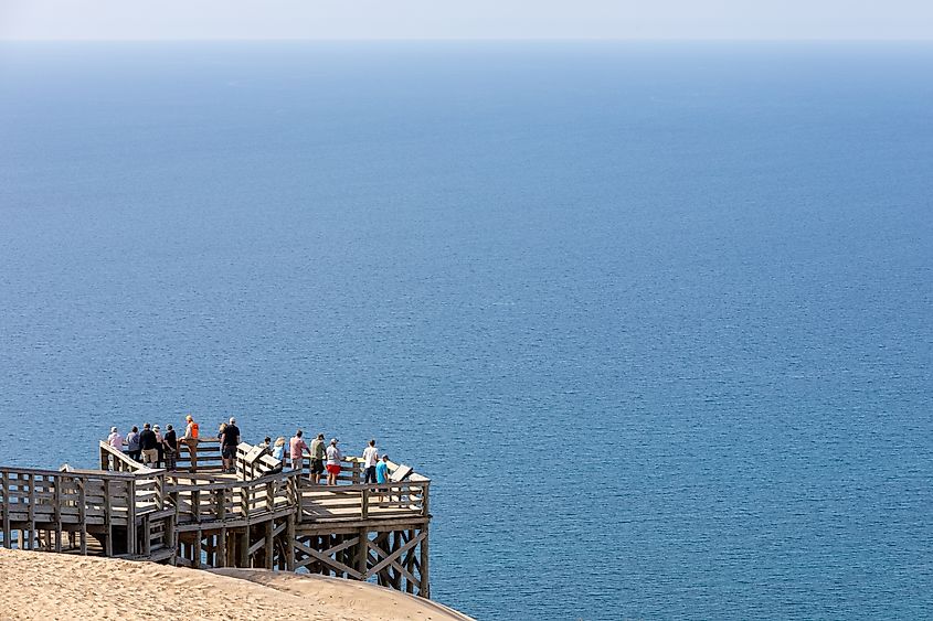 Scenic Overlook with visitors at Sleeping Bear Dunes National Lakeshore. Editorial credit: Michael Carni / Shutterstock.com